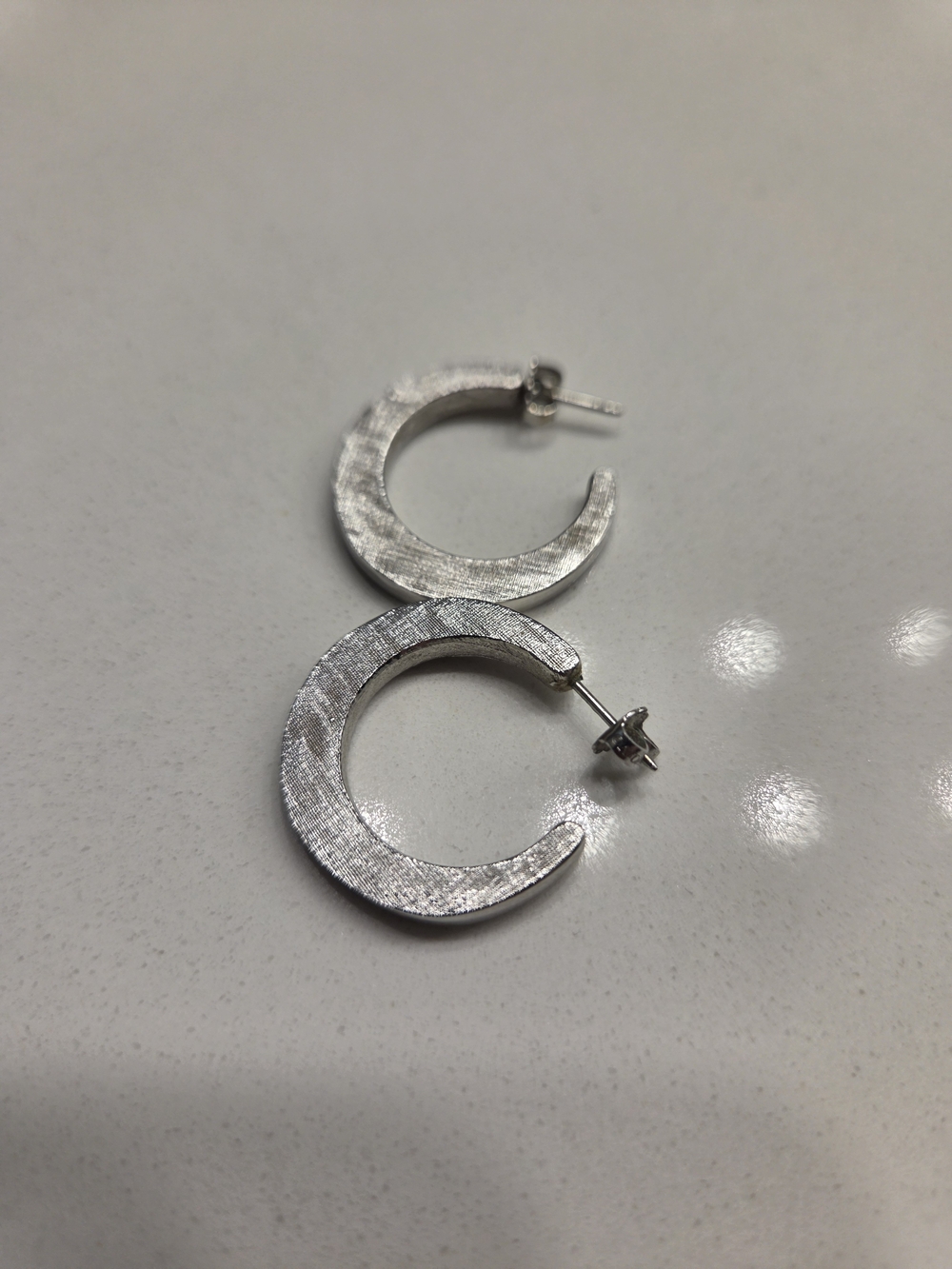 Vintage 1970s Avon Silver Textured Crescent Hoop Earrings